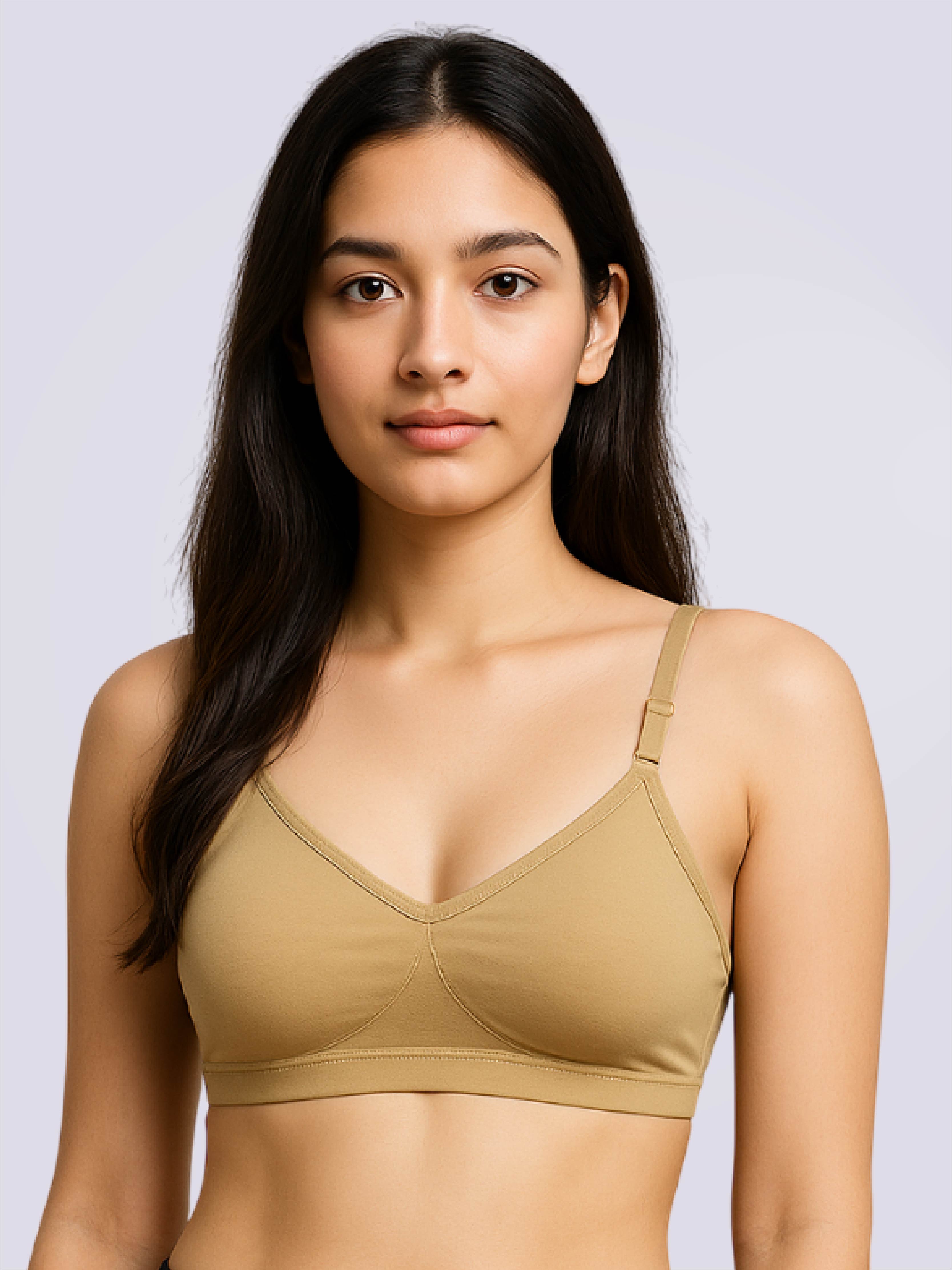 Woman wearing a Brown bra against a light gray background